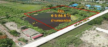 ที่ 6 ไร่เศษ สวยสง่าหน้ากว้าง 127 เมตร รูปทรงสวยเทพ  ย่านคลองน้อย ใกล้ ถ.เศรษฐกิจ 